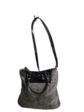 Kate Spade New York Anisha tote bag featuring a black and white chevron pattern